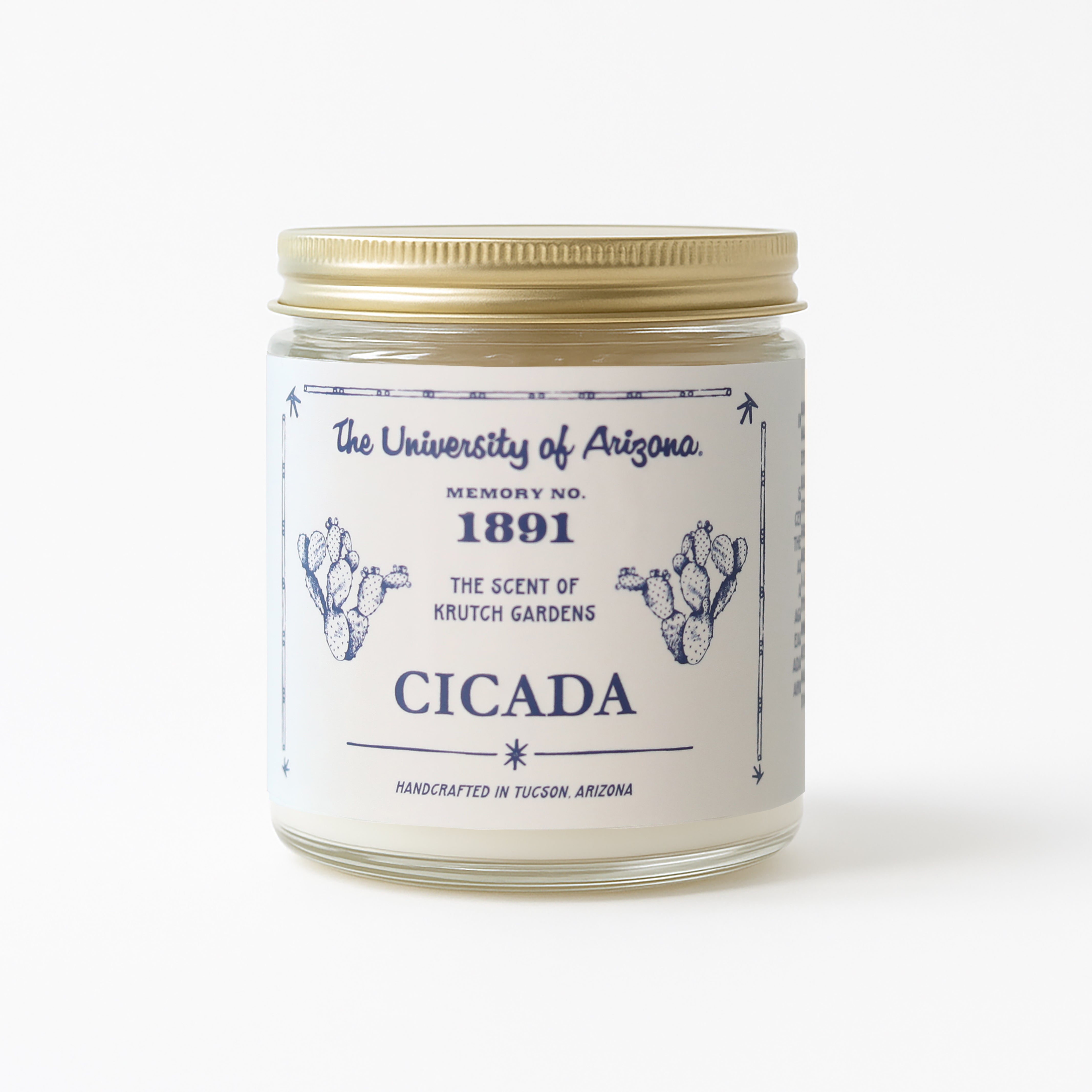 Candle jar with label featuring 'The University of Arizona' and 'Cicada' text on a white background