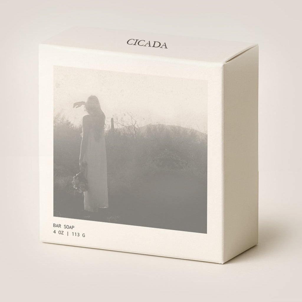 Product packaging with a silhouette design and 'Ocada' branding on a light background