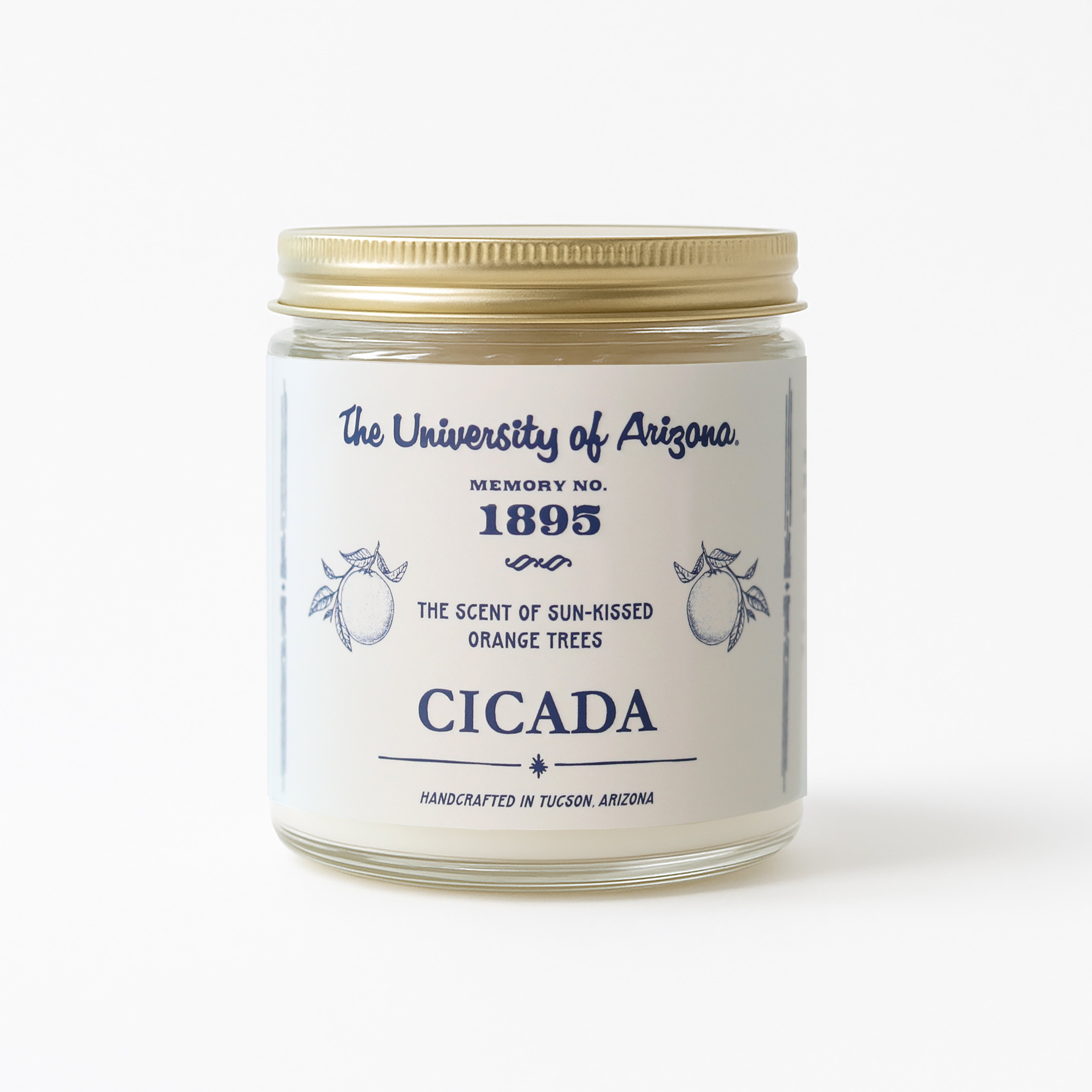 Candle jar with label featuring 'The University of Arizona' and 'Cicada' text on a white background