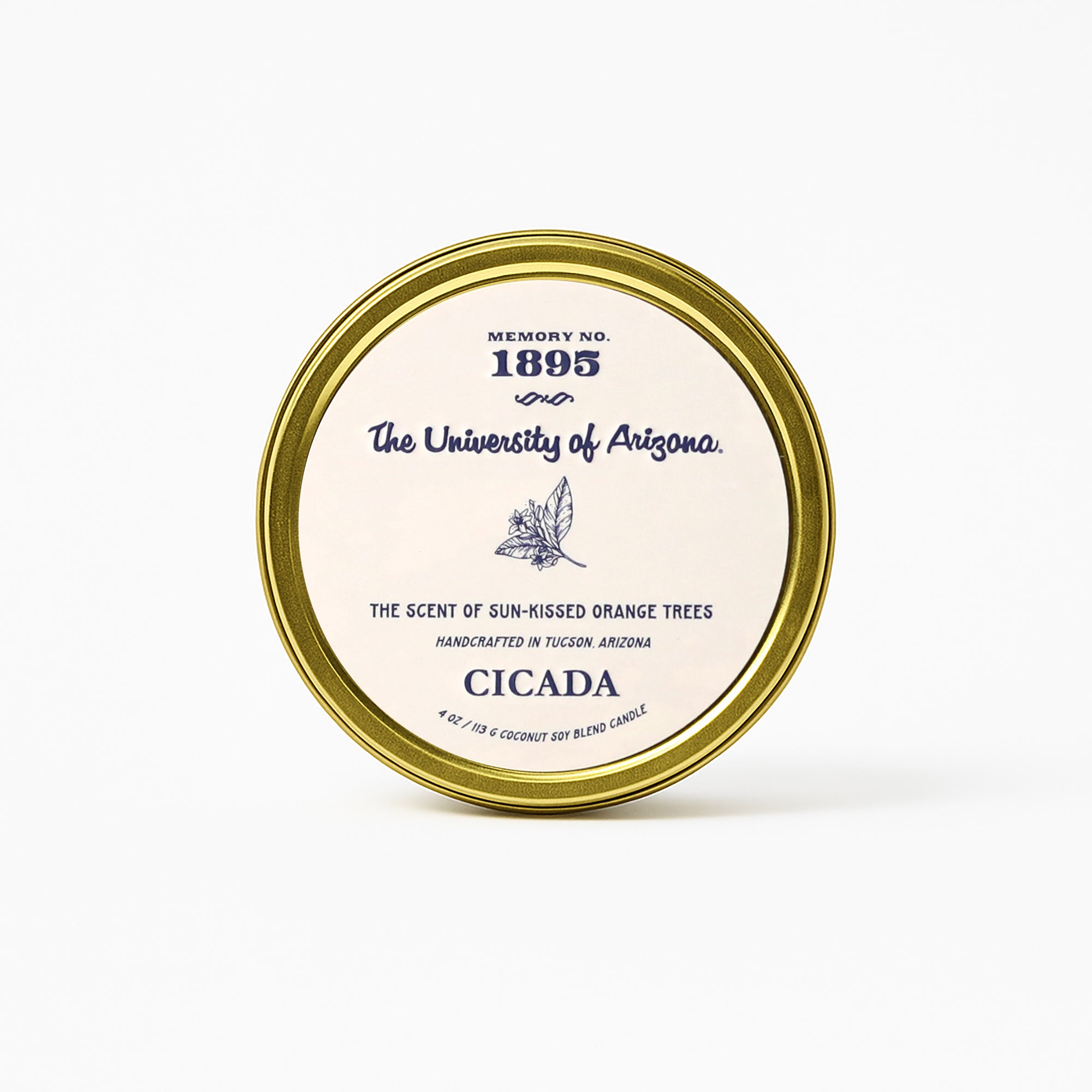 Candle container with 'The University of Arizona' branding on a white background. Text Reads "The Scent of Sunkissed Orange tress" Handcrafted in Tucson Arizona. 4 oz coconut soy blend.